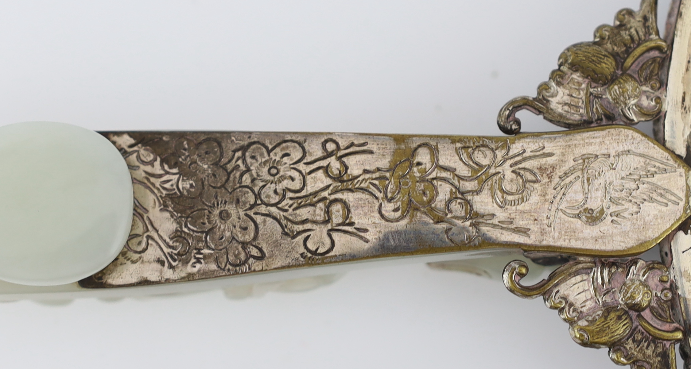 A Chinese celadon jade mounted hand mirror, the jade 18th/19th century